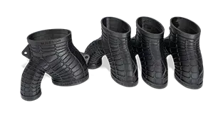 Um adaptador de coletor feito com Figure 4 RUBBER-BLK 10 