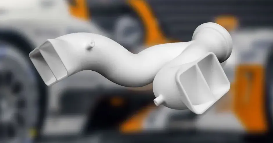 Peça de coletor SLS branca impressa em 3D com fundo