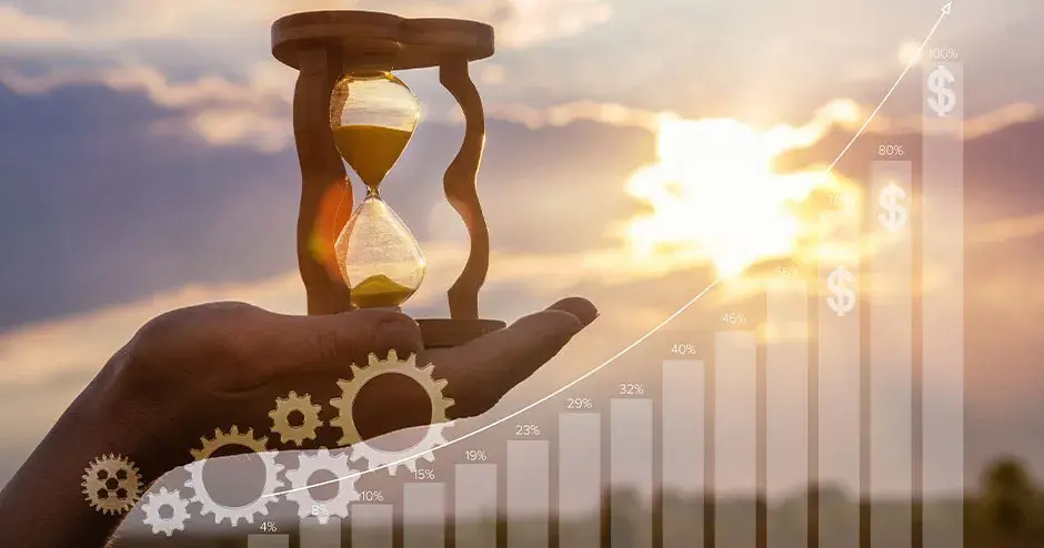 uma mão segurando uma ampulheta 