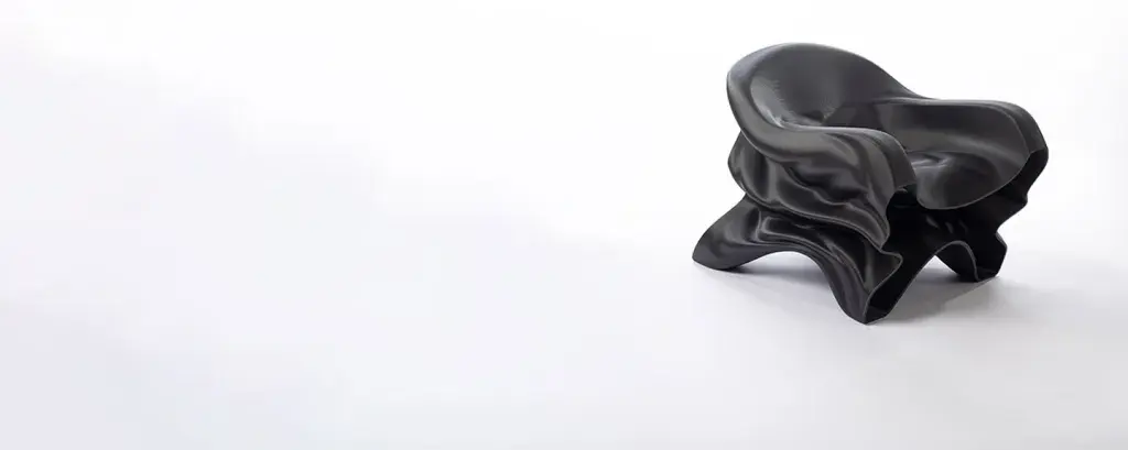 Steam lounge chair designed by Slicelab and 3D printed with PETG pellets on EXT 1270 Titan Pellet 3D printer.