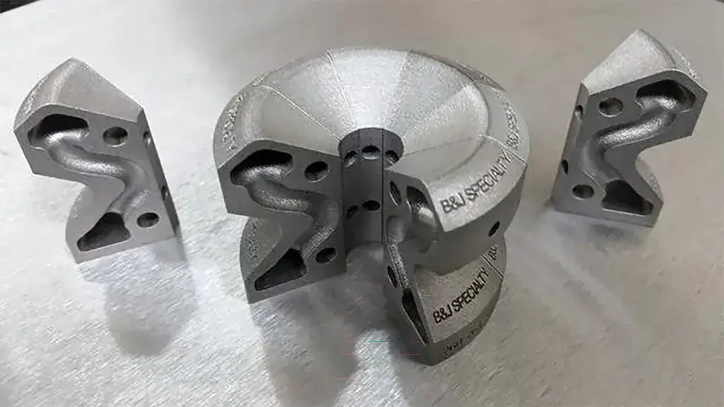Cut-away metal 3D printed insert shows conformal channels